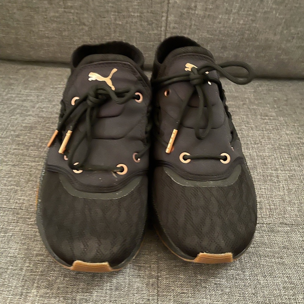 Black puma sneakers